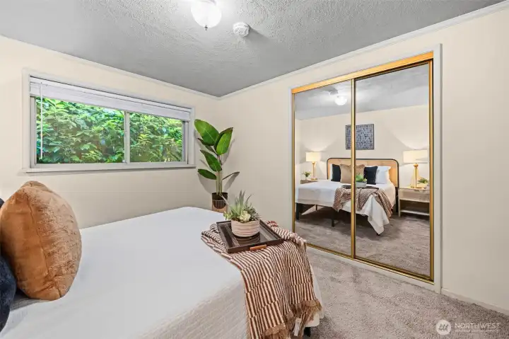Mirrored closet doors enhance both light and the feeling of spaciousness. Mirrored closet doors enhance both light and the feeling of spaciousness.