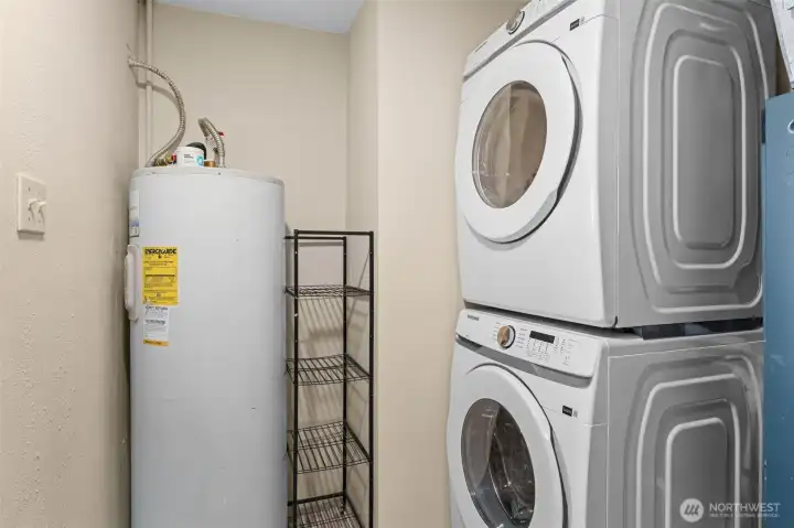 Stackable laundry plus the home's mechanical systems conveniently tucked away. Stackable laundry plus the home's mechanical systems conveniently tucked away.