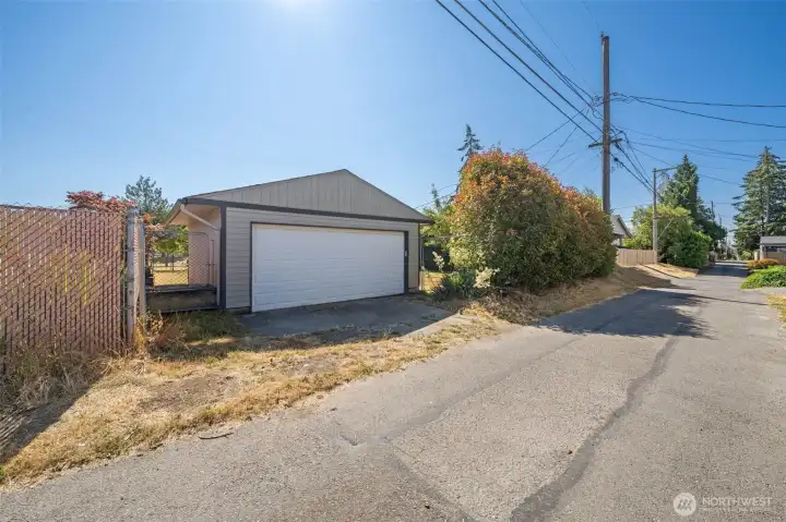 Convenient alley access to the detached garage offers added flexibility and exciting future DADU potential. Convenient alley access to the detached garage offers added flexibility and exciting future DADU potential.