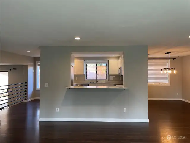 Dining on one side of kitchen and eating area and family room on the other side