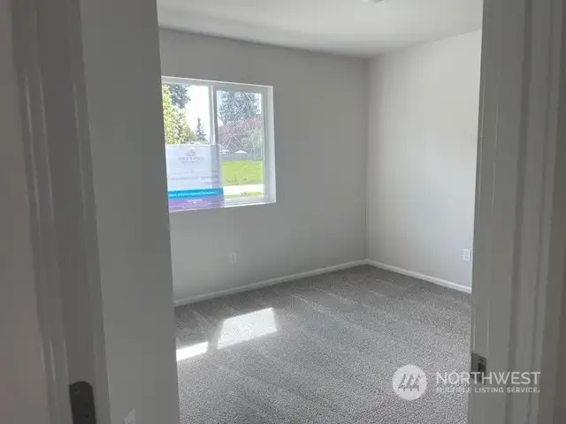front entry bedroom is light and bright