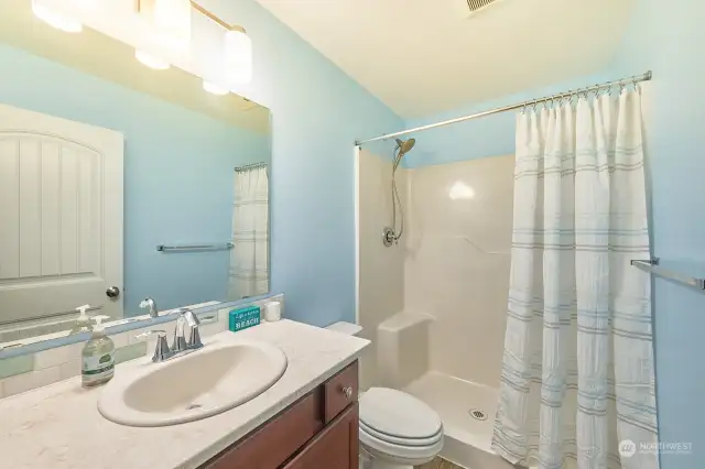 Bathroom with walk-in shower between the bedroom and office