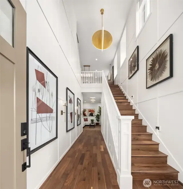 Dramatic two-story foyer. Photo of the Alabaster model home, includes upgrades & is not of actual home listed for sale.