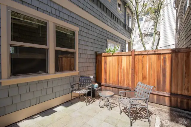 Front entry courtyard providing nice outdoor space. Easy main floor access for setting up the grill!