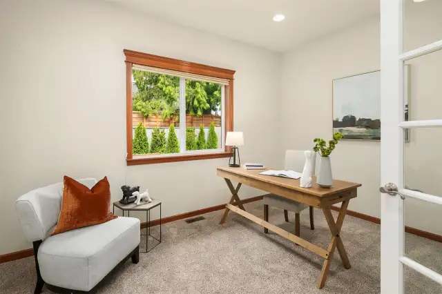 3rd bedroom is off the living room. The French doors allow endless options! Bedroom, office, guest quarters- you choose!