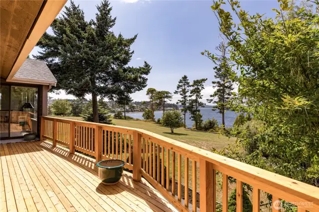 Deck with access from the Living room and the Primary
