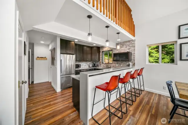 Chalet Breakfast bar, kitchen, balcony.