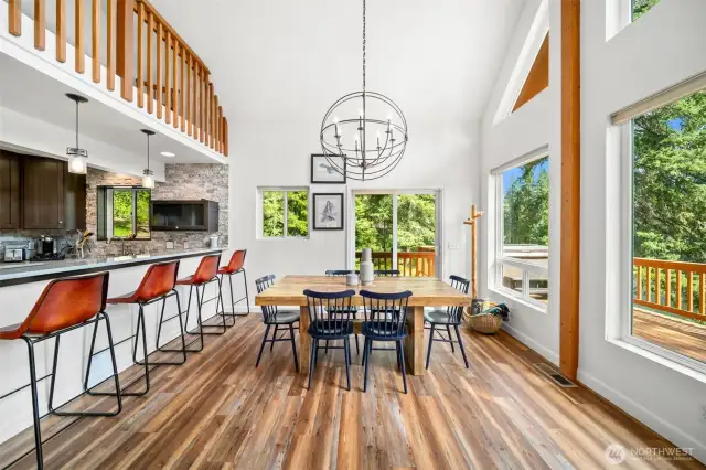 Kitchen, bar, dining area.