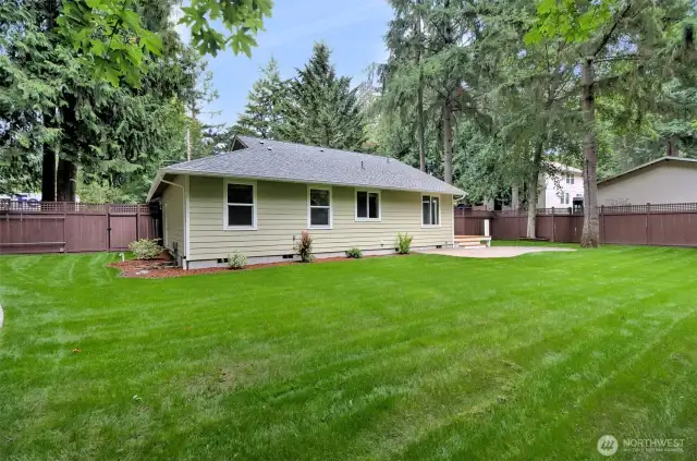Beautiful landscaping and fully fenced back yard
