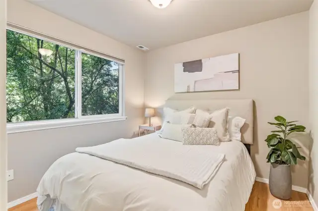 Comfortable lower-level suite with fresh finishes and its own ¾ bath.