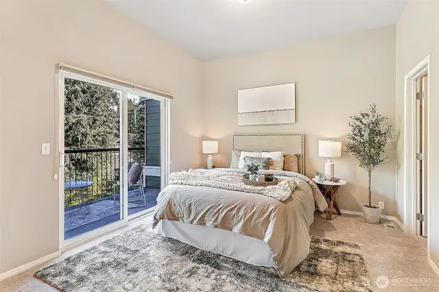 Private primary suite with direct patio access, perfect for enjoying morning coffee outdoors.