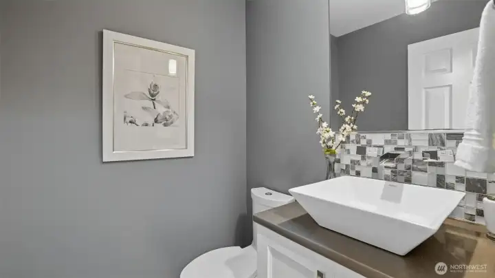 The main floor has a fully updated powder room just off of the family room.