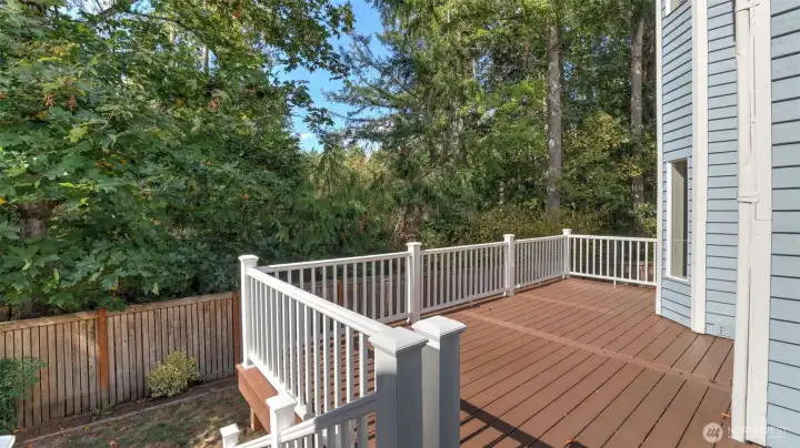 The deck is gorgeous with white railings and great sun exposure.
