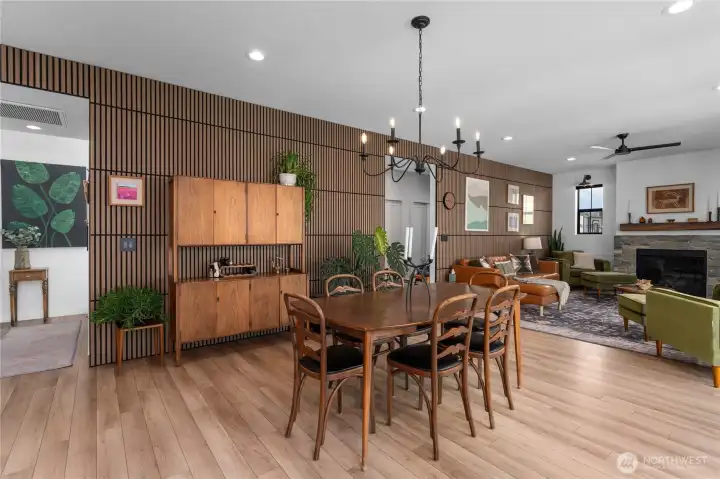 Gorgeous walnut sound panels create a warm sophisticated vibe to the open floor plan.
