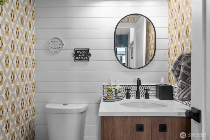 Half bath just off the den/office area.