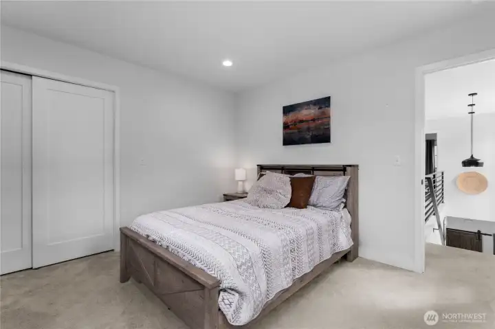 1 of 4 bedrooms on the upper level of the home.
