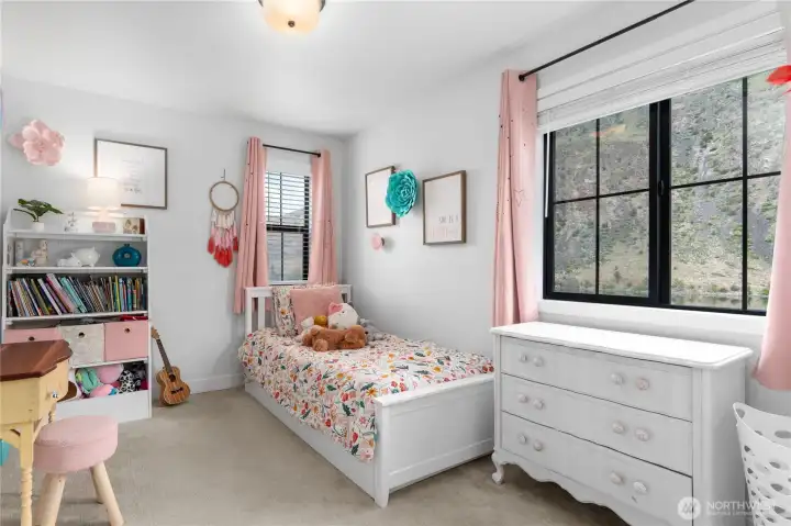 2 of 4 bedrooms on the upper level of the home.