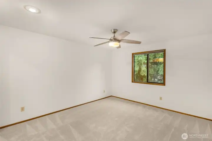 2nd bedroom with overhead fan.