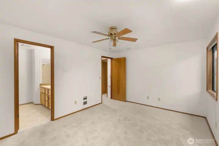 Large primary bedroom with en suite bathroom.