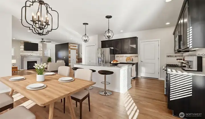 Open floor plan offers light-filled spaces designed for modern living. (virtually staged)