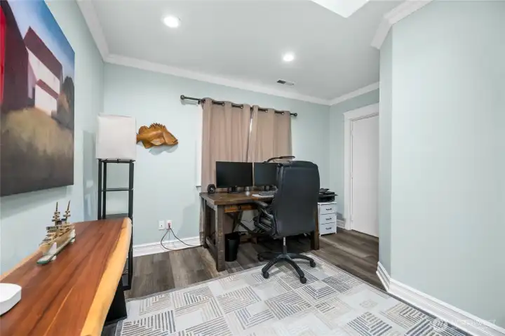 Versatile home office or flex room ideal for remote work, hobbies, or additional guest space.