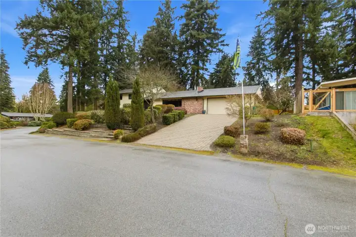 Situated on a quiet neighborhood street surrounded by mature trees and established homes.