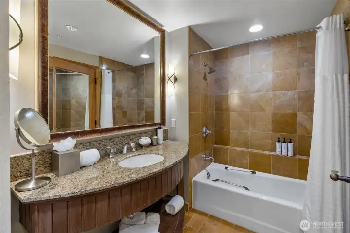 Well-appointed bathroom with upscale fixtuyres