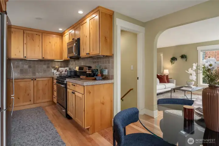 This beautiful kitchen features lots of counterspace and full height upper cabinets for great storage.