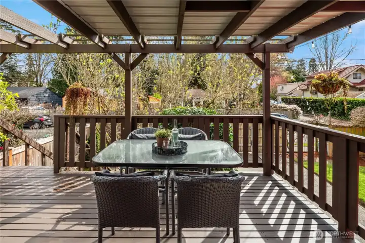 The back deck has this fantastic covered area perfect for barbecuing and dining even in the rain.