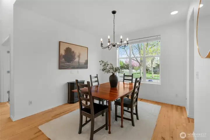 FORMAL DINING | This bright, beautiful dining room features a new chandelier and fresh paint.