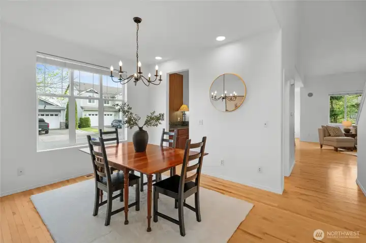 THE FLOW | Enter the front of the home into a long hallway that leads to the den, then the dining room, then a guest bathroom and into the living room and kitchen area.