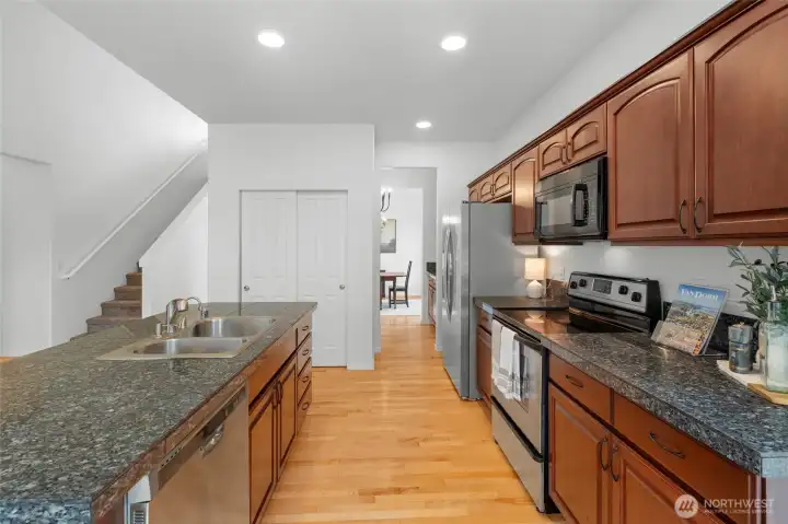 VIEW FROM THE KITCHEN | This kitchen has what you need...a pantry, a pass through to the formal dining room, a new fridge and connection that works.