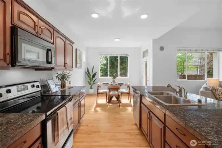 THE LONG VIEW | This is one of the common themes in this home; long, sweeping spaces that connect. With new interior paint throughout, new lighting and big windows, this home is bathed in light.