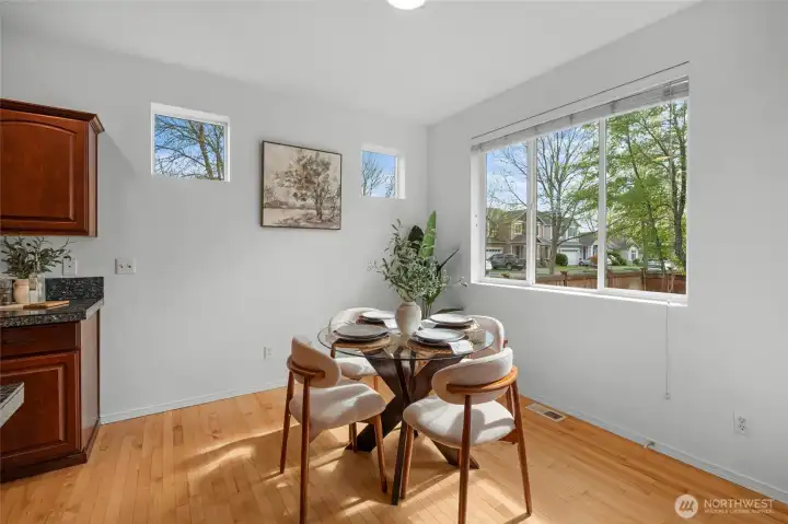 THE EAT-IN KITCHEN | With a flexible space that can be used for informal dining, an office area, an exercise bike or a children's play area, this home works!