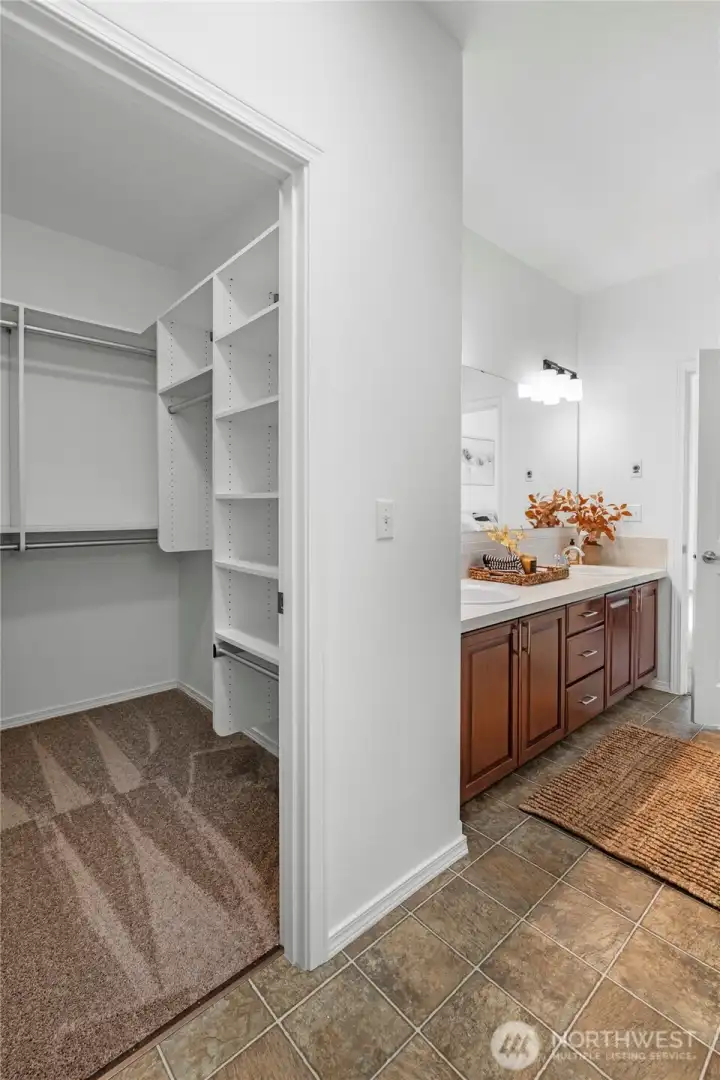PRIMARY BEDROOM CLOSET | New carpet and paint make this closet clean and ready to fill with your belongings.