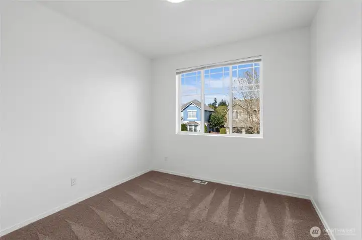 2ND FLOOR BEDROOM 1 | This room is located at the front of the home.