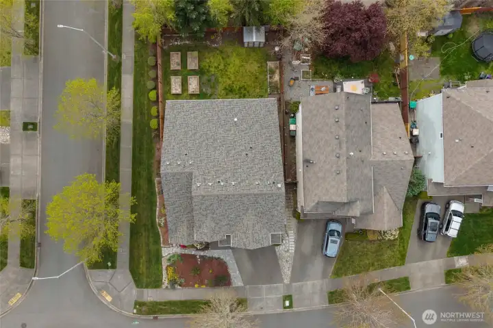 VIEW FROM ABOVE | This is a great shot of the brand NEW roof! You'll love the spacious lot with a fence along the side that's maintained by the HOA and was recently replaced.
