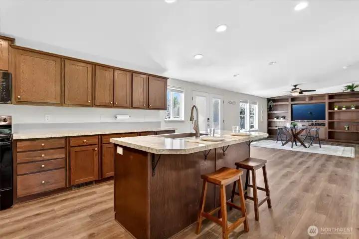 Kitchen with warm cabinetry and ample storage
