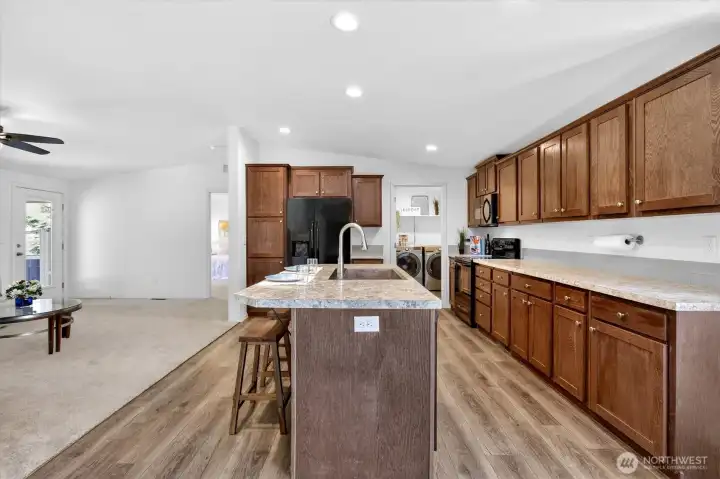 Kitchen featuring updated appliances and layout
