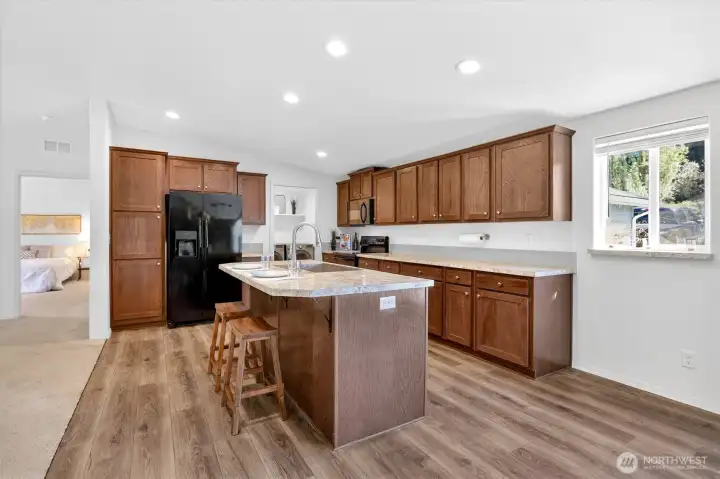 Additional kitchen view with abundant counter space