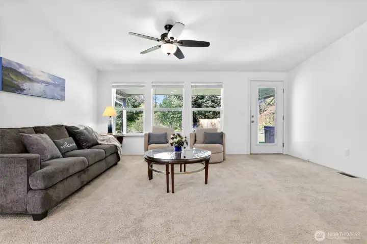 Comfortable living space with ceiling fan