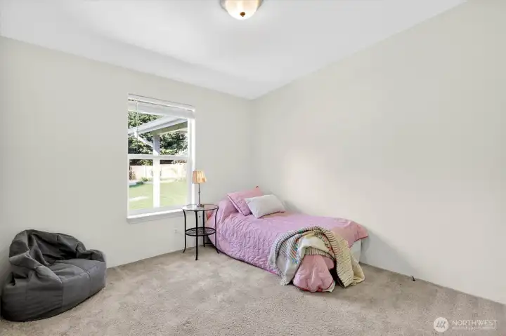 Additional bedroom with bright window