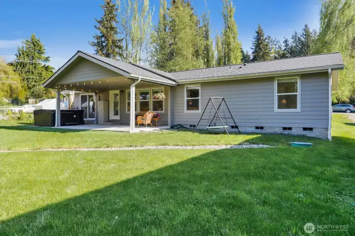 Backyard with lawn and exterior access