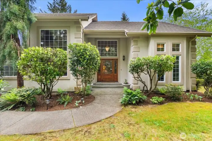 Enjoy peaceful golf course views from this beautifully maintained luxury home.