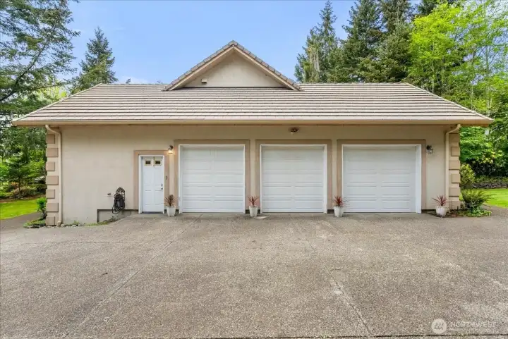 3 car garage plus...