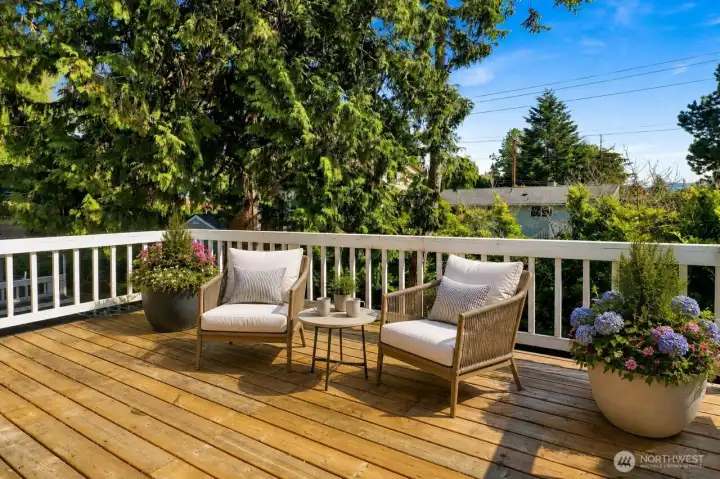 Deck off of primary bedroom, virtually staged