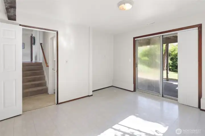 Lower level has direct access to the back yard.