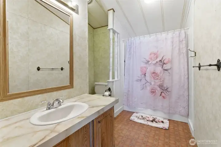 Lovely Primary En Suite w/Easy Care Vinyl Floor.