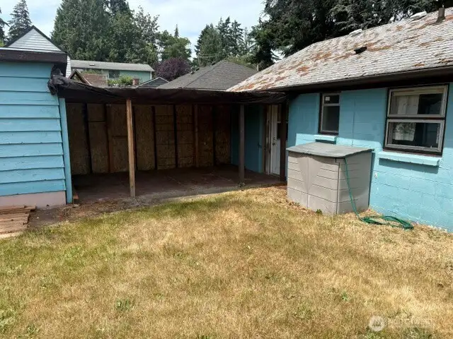 Covered Patio with Hot Water Heater.