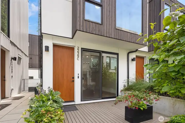 Large front patio as well as rooftop deck. Large front patio as well as rooftop deck.
